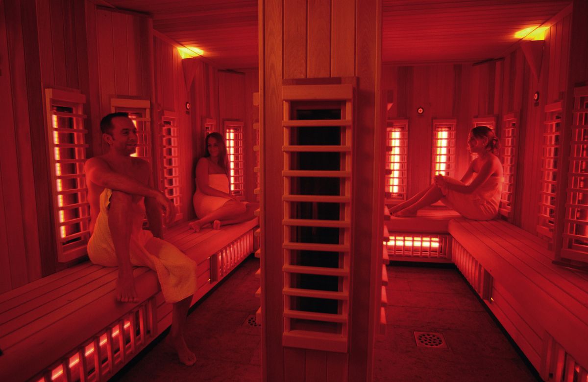 Modern infrared sauna setup in a luxury Dubai home with EMF-shielded panels.